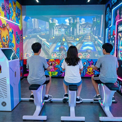 Qualität Virtuelle Fitness Spinning Bike Interaktives Bewegungssensing Widerstandsfähiges Fahrradfahren Fahrrad Bildschirmprojektion Sportmaschine usine